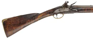 French Type C Fusil,
20 gauge 41-1/2" octagon-to-round barrel,
curly maple, brass trim, flintlock,
used, signed by John Donelson French Type C Fusil,
20 gauge 41-1/2" octagon-to-round barrel,
curly maple, brass trim, flintlock,
used, signed by John Donelson